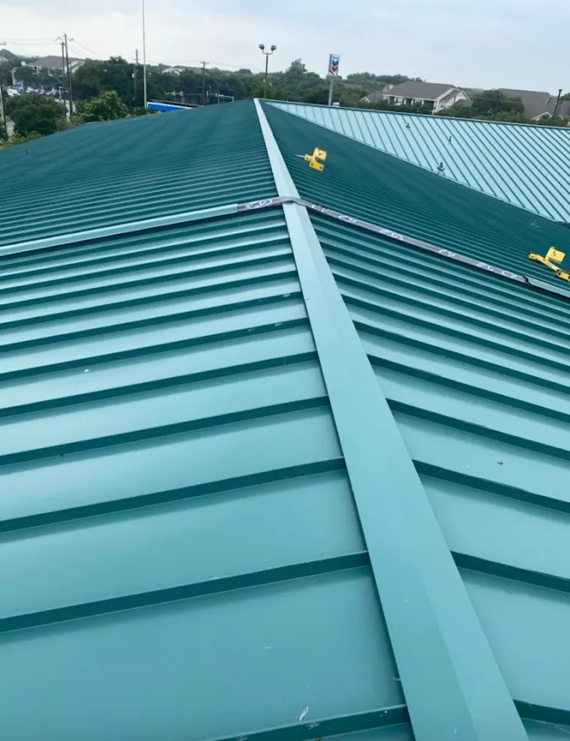Green commercial metal roof ridge and valley for Metal Roof Repair in Bowie