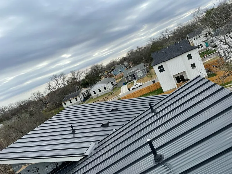 Standing seam metal roof panels with vents for Skylight Repair in Bowie